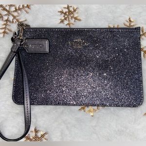Silver metallic Coach Wristlet